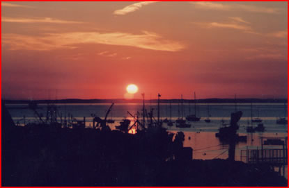 The sun setting on the water